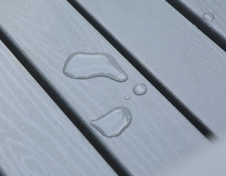 Silla de comedor gris para exteriores de HDPE con respaldo cruzado